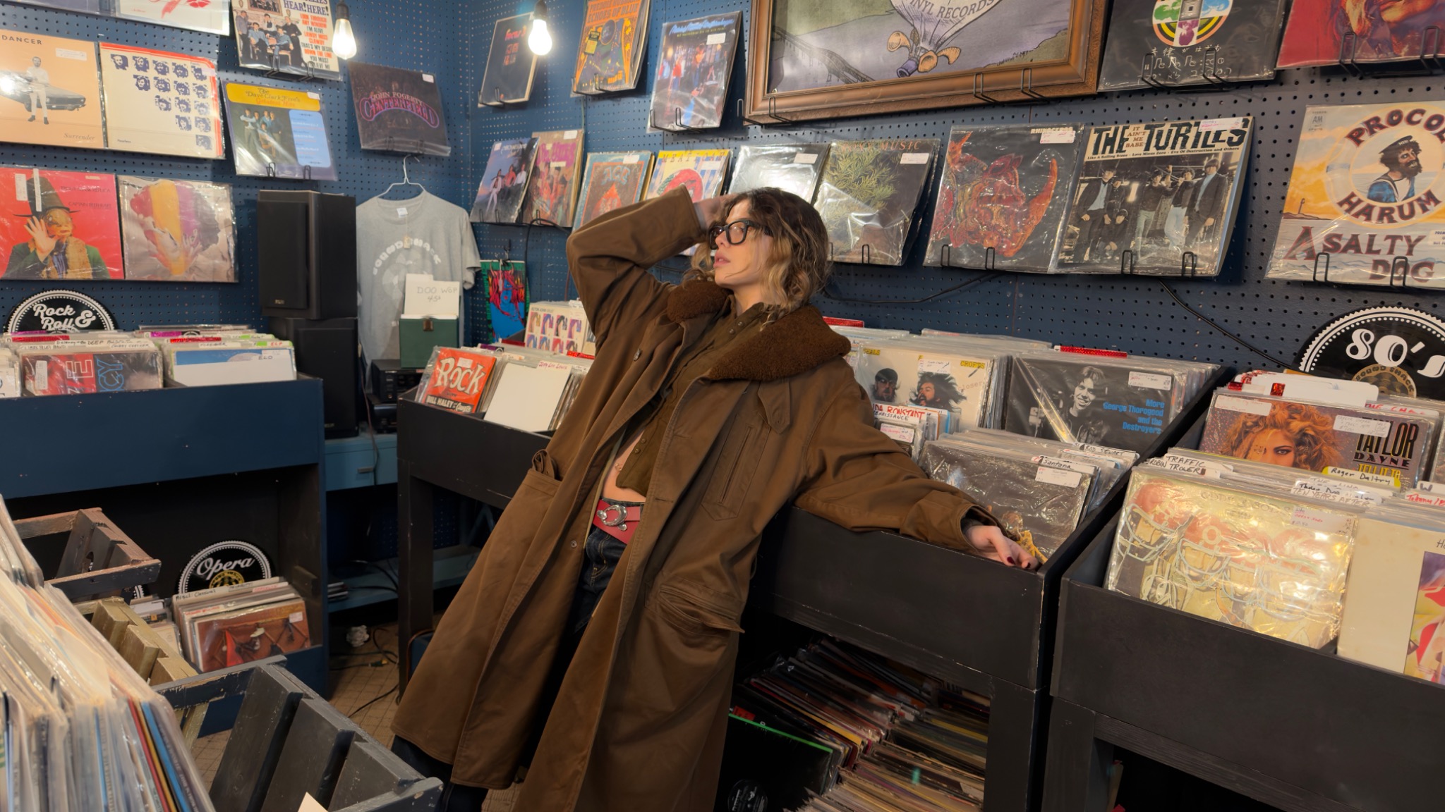 Beatriz Schoof exploring a record store in New York